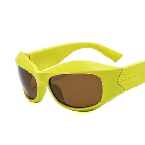 Y2K futuristic wraparound sunglasses in neon yellow matte frame with brown lenses