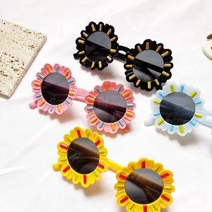 Kids sunflower sunglasses in candy colors featuring UV protection and daisy shaped frames