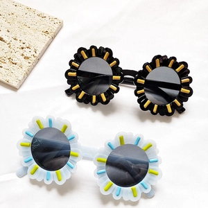 Cute sunflower shaped cartoon sunglasses for kids in jelly candy colors with UV protection