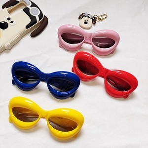 Set of retro cat eye children sunglasses in vibrant candy colors with thick resin frames