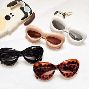 Kids vintage cat eye sunglasses in black, white, tortoiseshell and pink candy colors