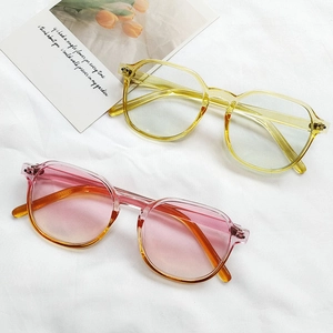 Fashionable gradient pink and yellow glasses on white background with decorative card