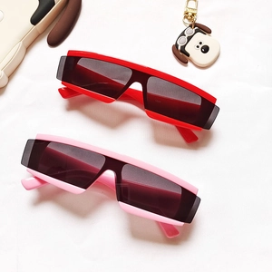 Futuristic kids oversized wrap-around sunglasses in red and pink colors