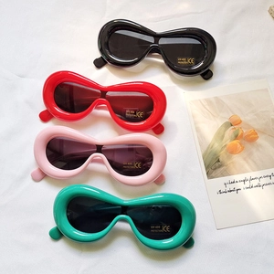 Oval chunky sunglasses for kids and adults with UV400 protection in four vibrant colors
