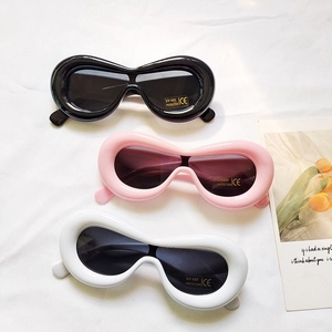 Kids chunky candy-colored sunglasses with UV400 protection in black, pink, and white
