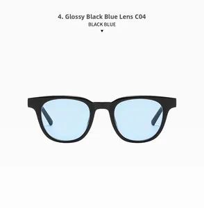 Detail view of bright black resin sunglasses frames with blue lenses model C04
