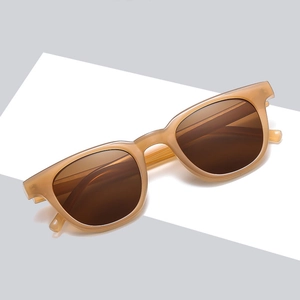Unisex resin sunglasses in translucent honey frame with brown lenses for outdoor