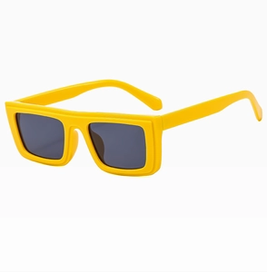 Detail of bright yellow square frame sunglasses with dark grey UV protective lenses