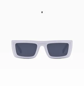 Front view of modern square thick white frames with dark grey lenses and solid resin temples