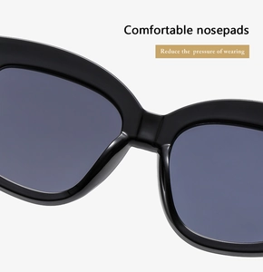 Close-up of integrated resin nose pads on oversized sunglasses for pressure reduction