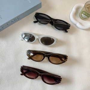 Retro cat-eye sunglasses for men and women in black, white, amber, and red color options