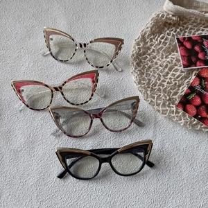 Cat eye blue light glasses frame with golden metal trim in four stylish color variations