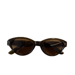 Vintage cat-eye resin sunglasses in dark brown with UV400 lenses and metal rivets