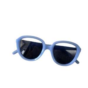 Retro oversized round sunglasses with light blue frame and dark lenses for men and women
