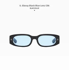Details einer Retro-Oval-Sonnenbrille in Schwarz mit blauen Gläsern und Silbernieten