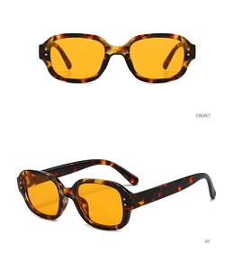 Dual view of retro oval sunglasses featuring tortoiseshell frames and amber lenses