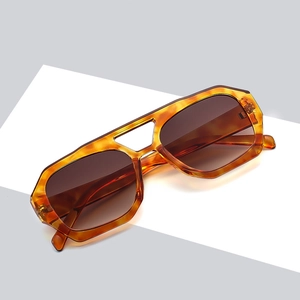 Vintage irregular amber double bridge sunglasses with brown gradient lenses