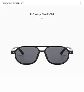 Detail of pilot sunglasses with double-bridge frame and silver rivet accents