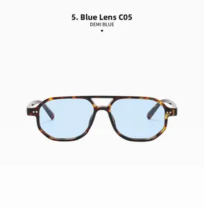 Detail of retro pilot sunglasses with demi blue frame and polished metal rivets