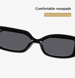 Macro view of integrated comfortable nosepads on stylish black sunglasses