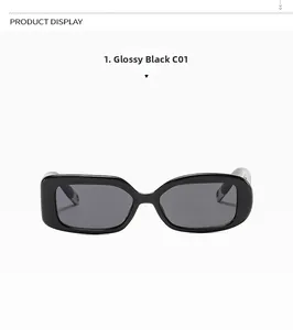 Close-up of sleek black rectangular sunglasses frame with glossy finish and grey lenses