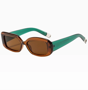Macro view of retro oval sunglasses with brown translucent frames and green temples