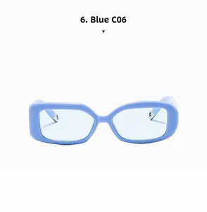 Close-up of modern rectangular blue sunglasses with thick frames and translucent lenses