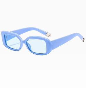 Side view of light blue retro rectangular sunglasses with thick frames and silver accents