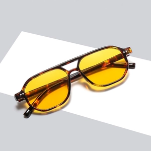 Retro double-bridge pilot sunglasses with tortoiseshell frame and yellow lenses