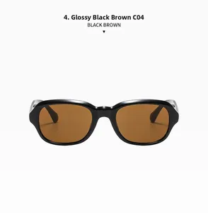 Vue détaillée de lunettes de soleil ovales rétro avec monture noire et verres bruns