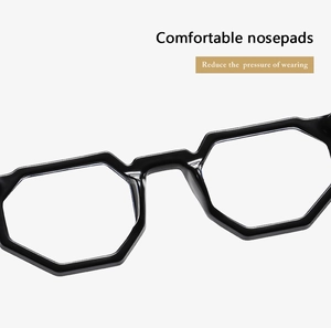 Detail of comfortable integrated nose pads on black geometric irregular eyeglass frames