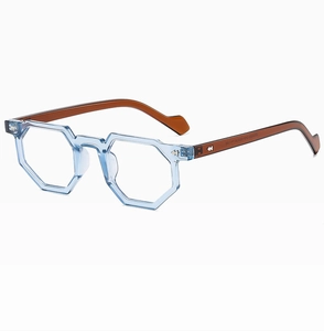Detail view of light blue irregular frame and amber temples with silver hinge accent
