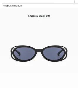 Détail de lunettes de soleil ovales noires avec accents métalliques argentés et verres gris