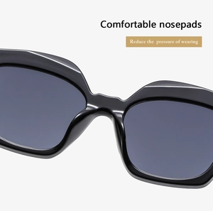Macro detail of comfortable nose pads on black oversized sunglasses reducing pressure