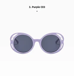 Detailed close-up of light purple round sunglasses featuring unique hollowed-out frame design
