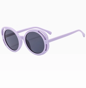 Detail of light purple butterfly frame sunglasses with grey round lenses for girls