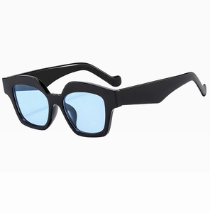 Side view of square sunglasses with thick black frame and light blue tinted lenses