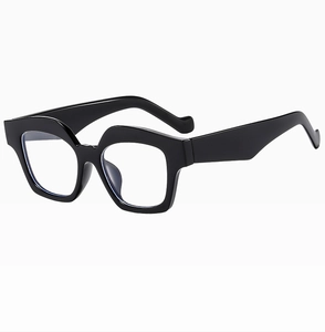 Detail view of bold black wavy geometric glasses frames with thick rectangular design