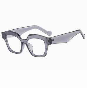 Close-up of trendy transparent gray square cat-eye sunglasses with modern geometric frame
