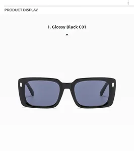 Details der glänzend schwarzen rechteckigen Sonnenbrille mit Nieten und blauen Gläsern