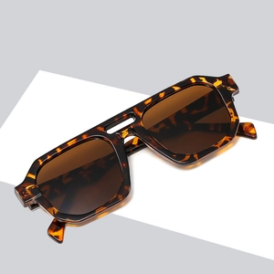 Oversized tortoise shell punk sunglasses with brown lenses and a stylish double bridge design