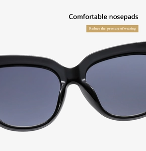 Gros plan sur les plaquettes de nez intégrées pour le confort des lunettes de soleil noires