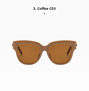Vue détaillée de lunettes de soleil œil de chat oversize marron café avec monture polie