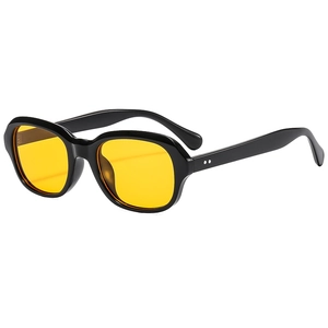 Retro oval sunglasses with thick black frames and stylish transparent yellow lenses