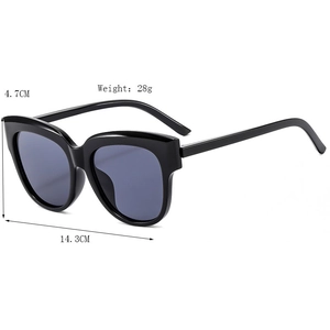 Lunettes de soleil œil de chat rétro avec monture noire et verres violets