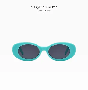Detail view of oval light green sunglasses frames with dark lenses in C03 color code