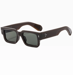 Close-up of retro square sunglasses featuring thick brown frame and arrow metal rivets