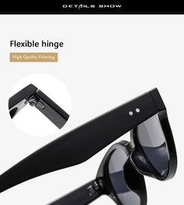 Macro view of flexible hinge and high-quality glossy finish on black oversized sunglasses