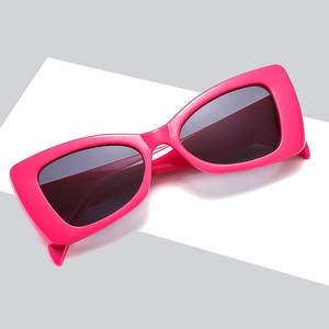 Fashionable rose pink rectangular sunglasses with dark lenses and UV protection