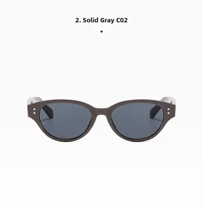 Flat lay of retro grey cat eye sunglasses in color C02 with sharp frame details